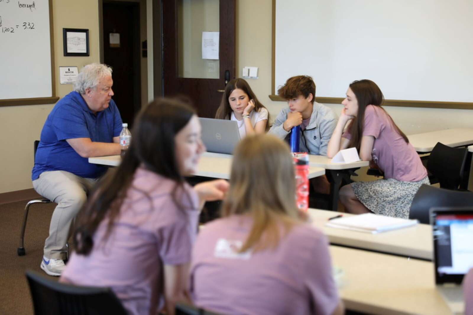 Dr. Geenens teaching a business leadership class