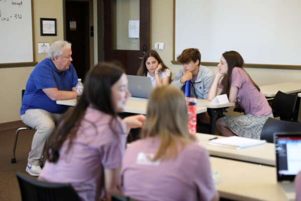 Dr. Geenens teaching a business leadership class