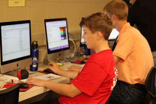 Students coding in the computer lab