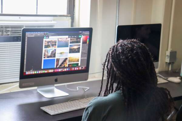 A high school student works at a computer during BCYC Immersion