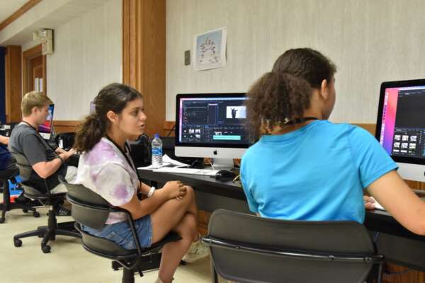 Students editing photos on computers