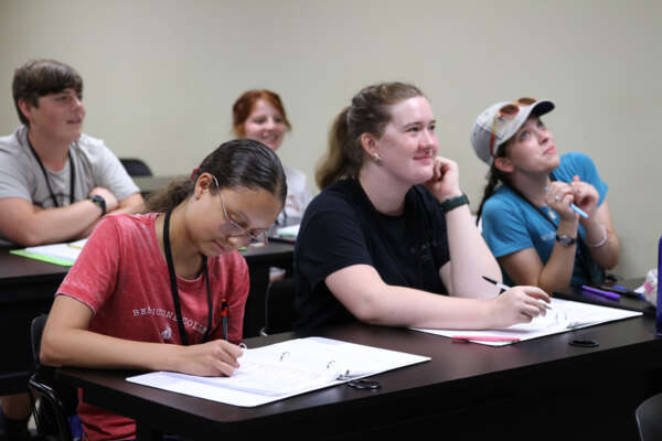 students taking notes in a lecture