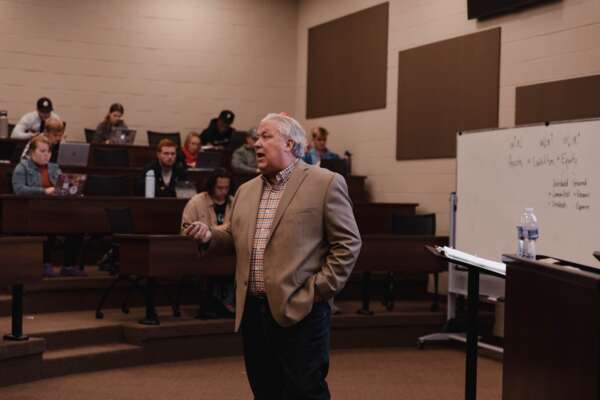 Dr. Geenens giving a business accounting lecture