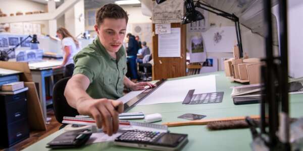 architecture student working on designing a project