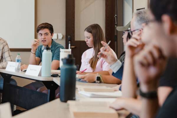 students in a discussion circle