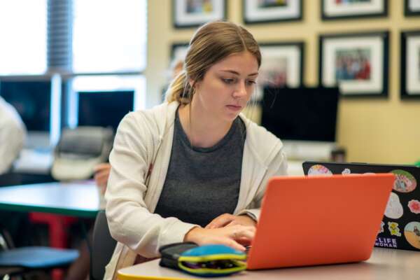 Student working on a laptop