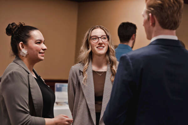 Students talking at the Business Summit