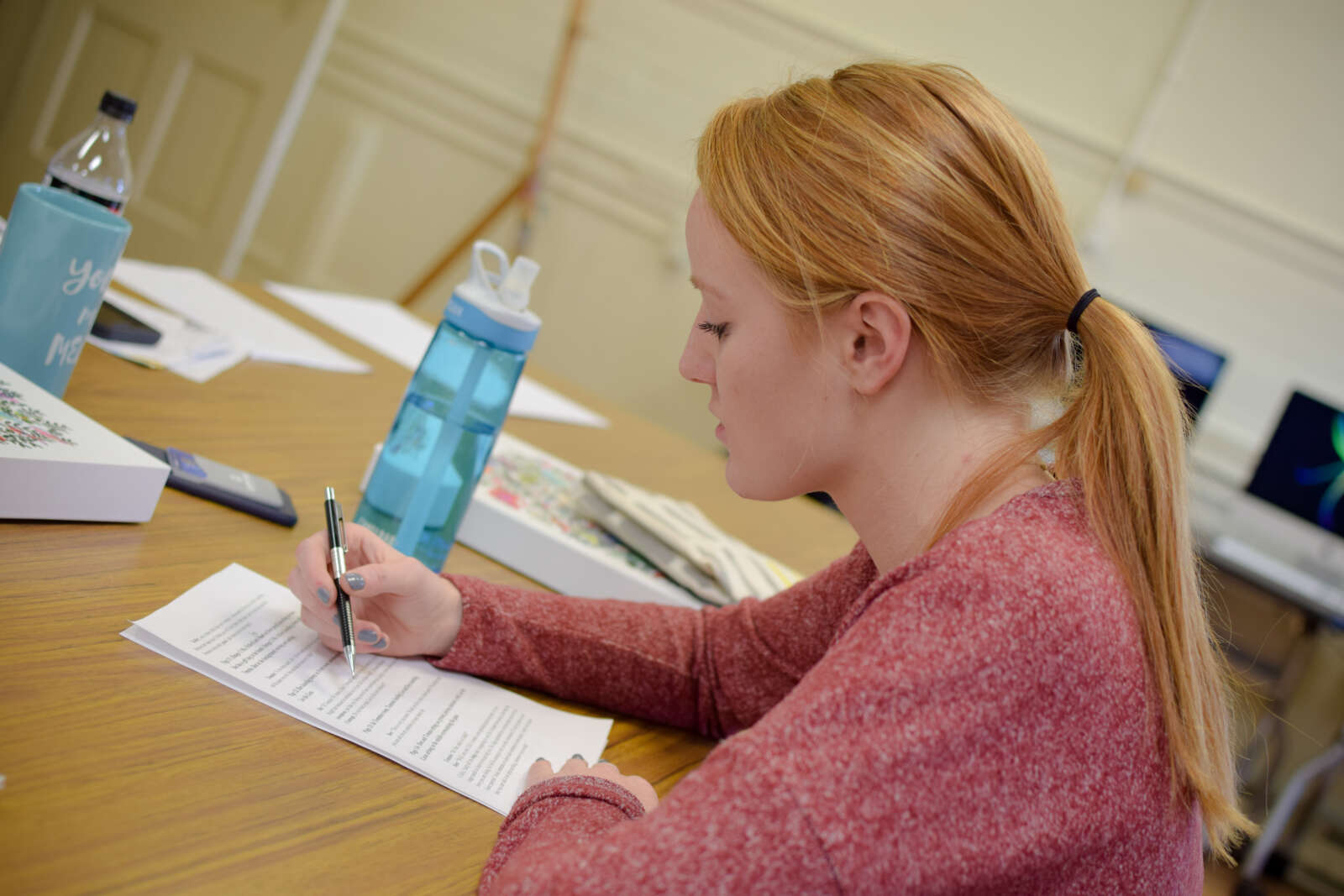 Student studying at a table