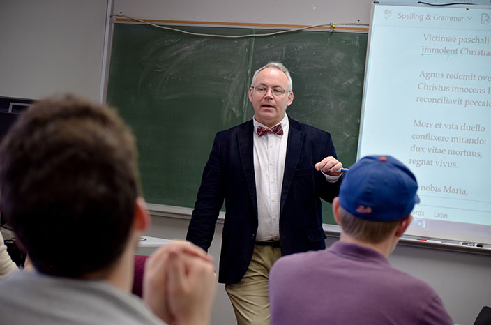 Dr. Edward Mulholland teaches in class