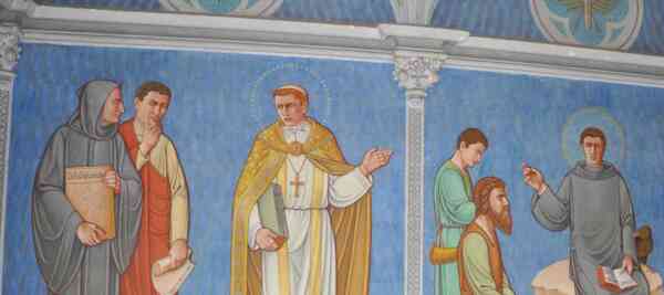 A wall mural depicting multiple historical and religious figures