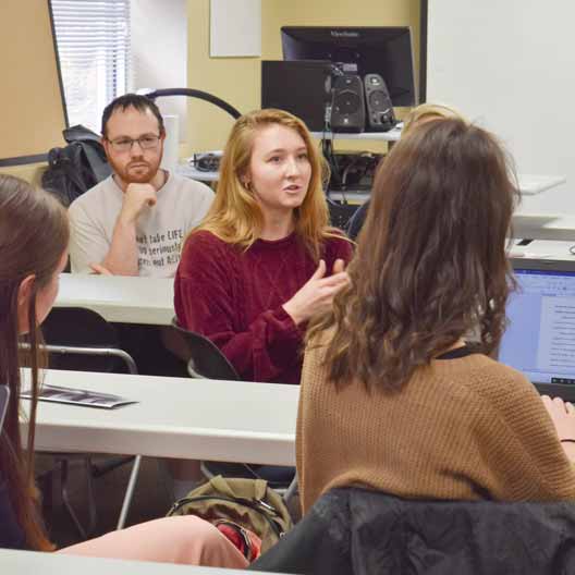 Students discussing in class