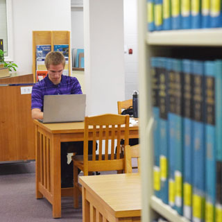 Student studying in the library