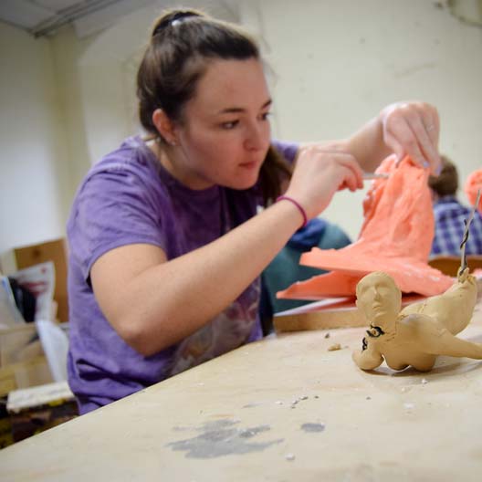A student in sculpture class