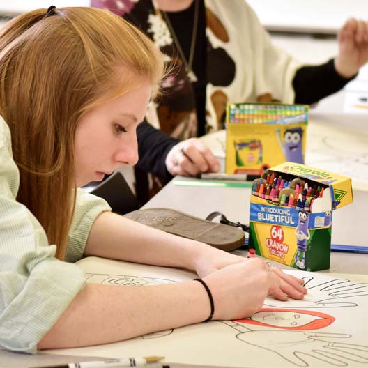 A student in art education class