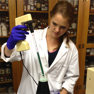 Student with a pipet