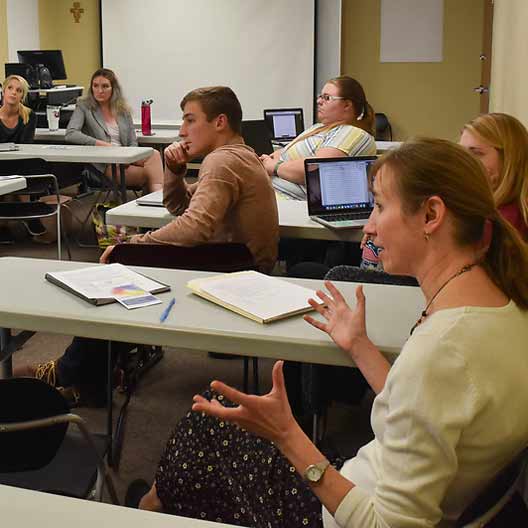 Students having a discussion in class