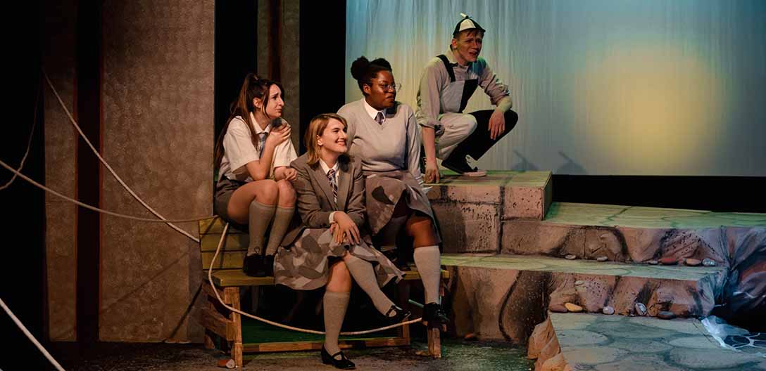 Student actors in a theatre production