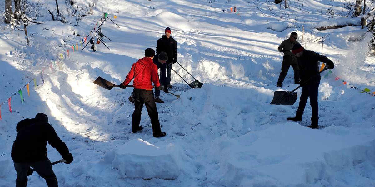 BC students shoveling a path in the snow in Alaska